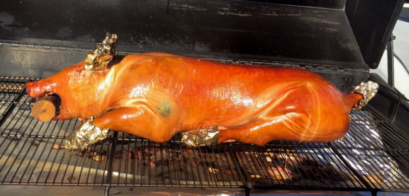 Whole Hog Cooks on a Meadow Creek Pig Roaster