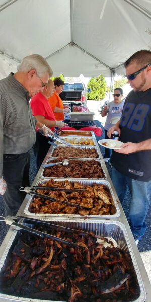 Company Picnic for 550 People Cooked on the Meadow Creek PR72T Pig Roaster Trailer