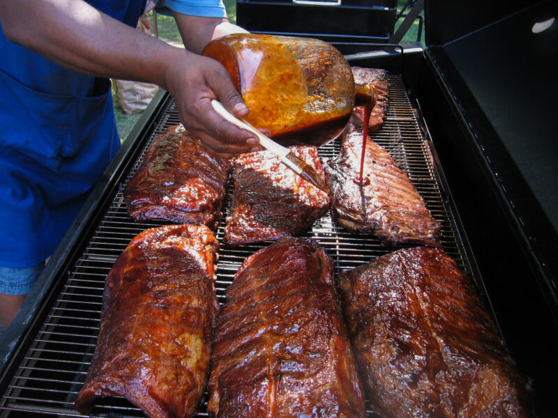 Pork Ribs on a Meadow Creek Pig Roaster and Meadow Creek BBQ42 Chicken Cooker Trailer